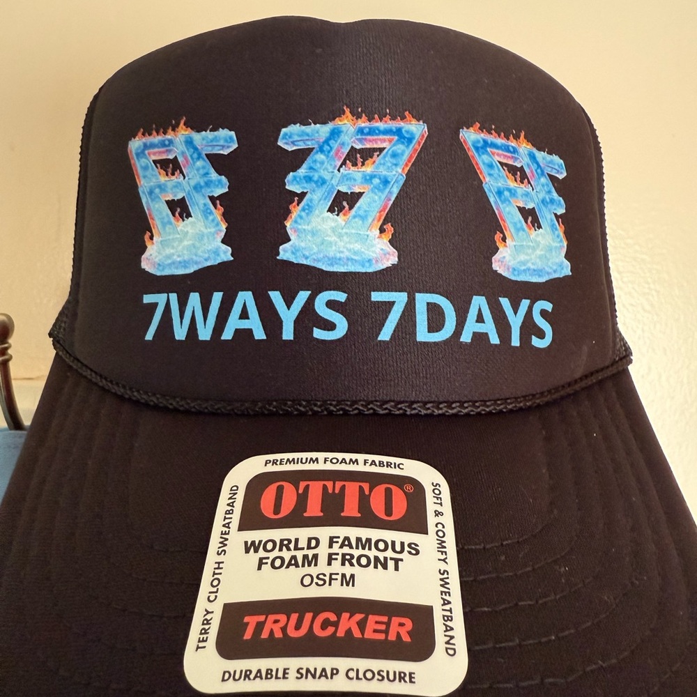 7WAYS 7DAYS Black Trucker Hat with Blue and Orange Flame Design